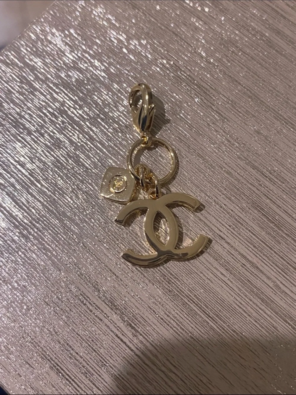 CHANEL Gold Double C Charm Pendant with Lobster Clasp